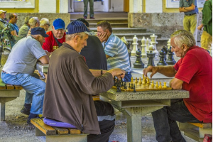 Senior citizens playing chess